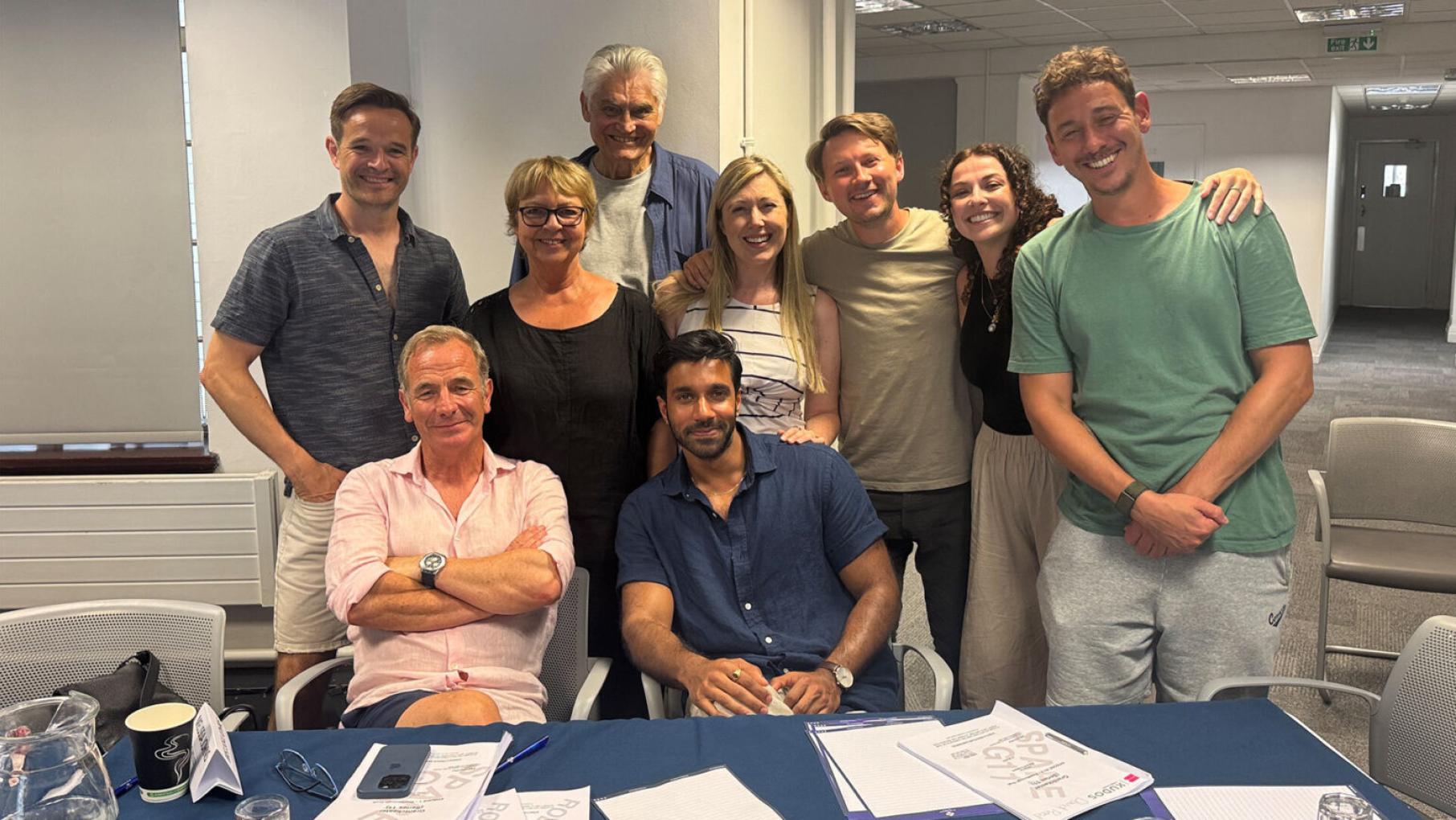 The cast of Grantchester poses for a smiling photo